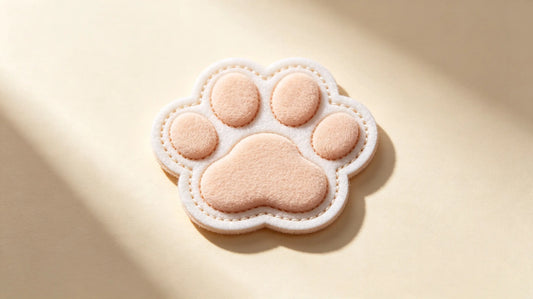 Single lovely pet themed 3D raised foam embroidered patch, bright warm studio product shot, delicate layered embroidery relief.