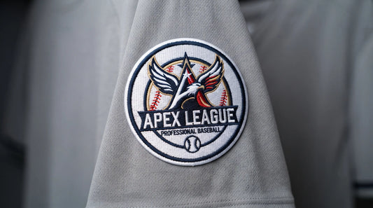 A professional demonstration of an Apex League baseball patch heat-pressed onto performance fabric, showcasing clean edges and professional-grade durability for sports apparel.
