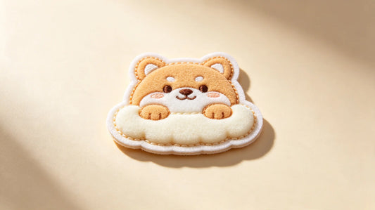 Single cute kids 3D raised foam embroidered animal mascot patch, soft pastel studio background, clean product shot.