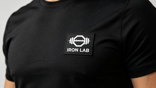 Minimal flat sublimation custom gym logo patch on modern black fitness activewear t-shirt